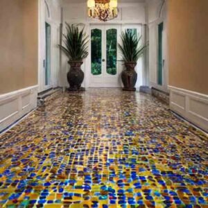 Intricately designed mosaic tiles floor adding a touch of luxury to the space